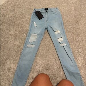 Fashion Nova Light Blue Distressed Skinny Jeans